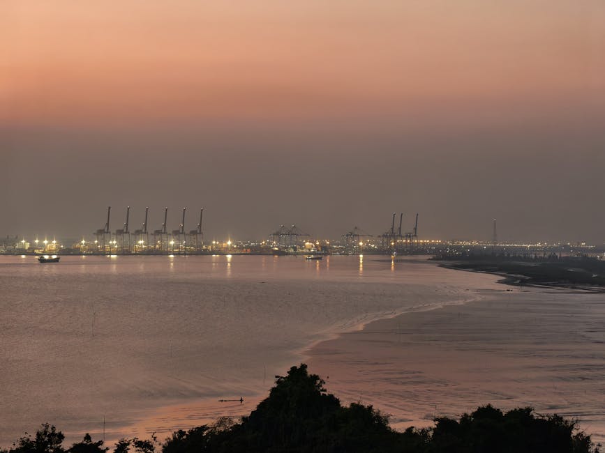 Vibrant twilight view of Hai Phong Port, Vietnam, illuminating the serene coastal landscape.