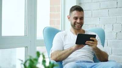 real estate agent using CRM on tablet