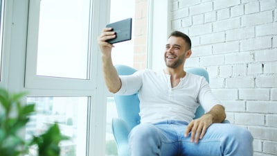 real estate agent using smartphone for customer communication