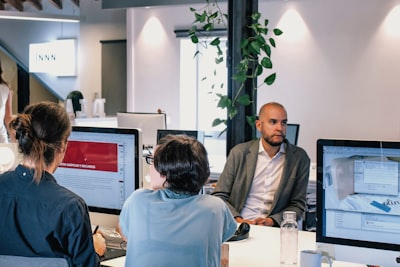 real estate team collaborating on software