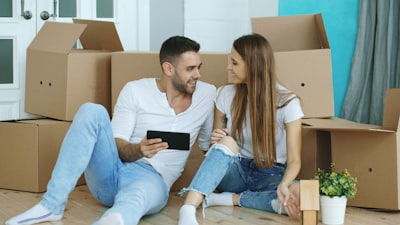 real estate agent showing property to couple