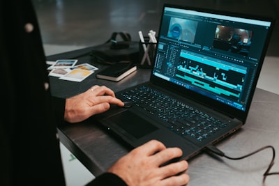 video editing software interface on laptop