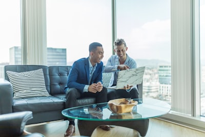 real estate agent showing smart home features to client