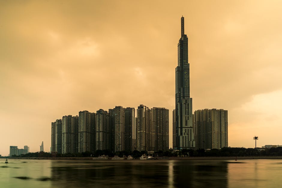 Dramatic view of Landmark 81 and modern architecture at sunset in Ho Chi Minh City, Vietnam.