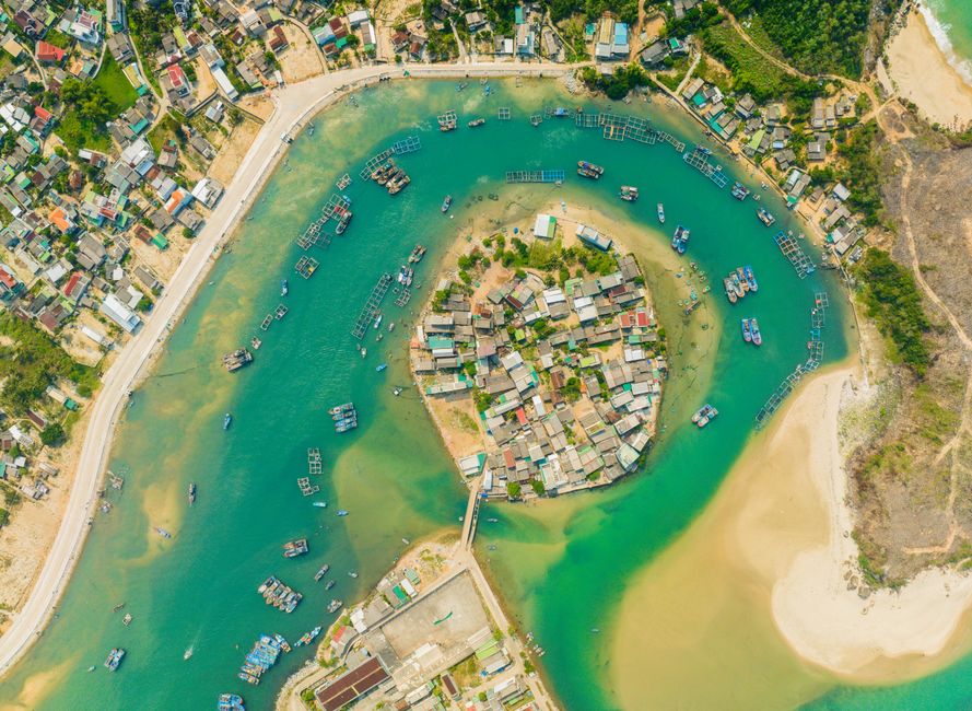 Discover the unique aerial perspective of a coastal town on an island in Quảng Ngãi, Vietnam.