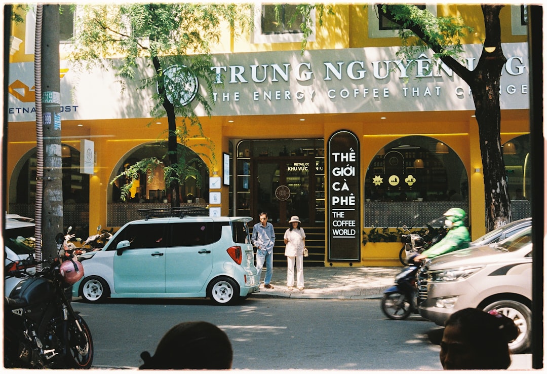 A group of people standing in front of a building