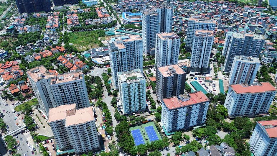 Aerial photography showcasing high-rise buildings in Hanoi, Vietnam, highlighting urban life and architecture.